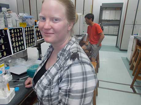 photo of katrina hofstetter with a bat on her shoulder