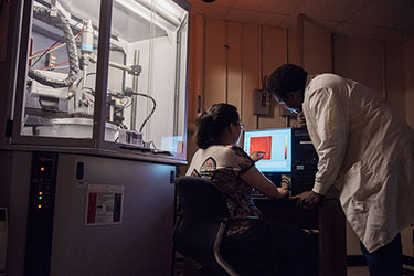 lab technicians reading x-rays