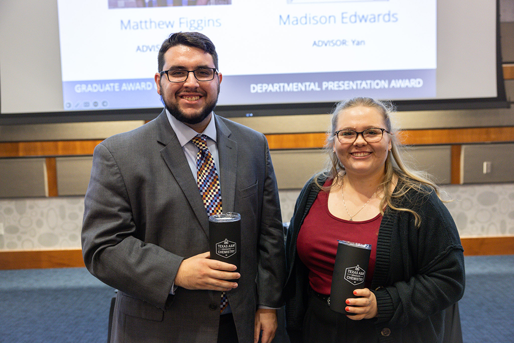 man and woman pose for photo at Grad Presentation 2023