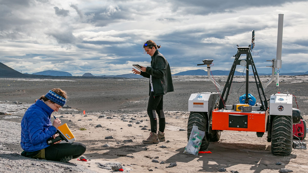 Students calibrating a replica Mars rover