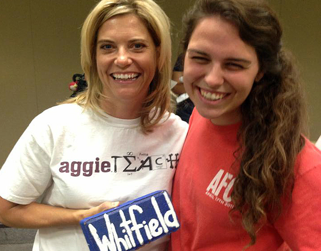 Texas A&amp;M mathematician Dr. Jennifer G. Whitfield (left), being surprised by a Fish Camp counselor as the namesake for Camp Whitfield in 2013