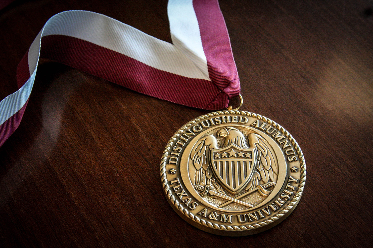 A Texas A&amp;M Distinguished Alumnus gold medallion