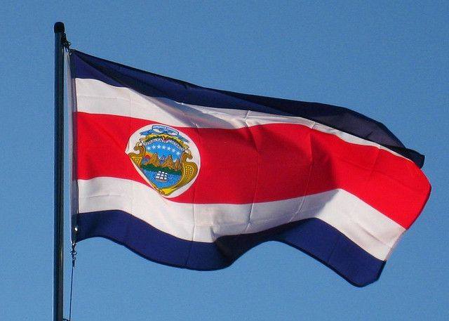 Flying flag of Costa Rica