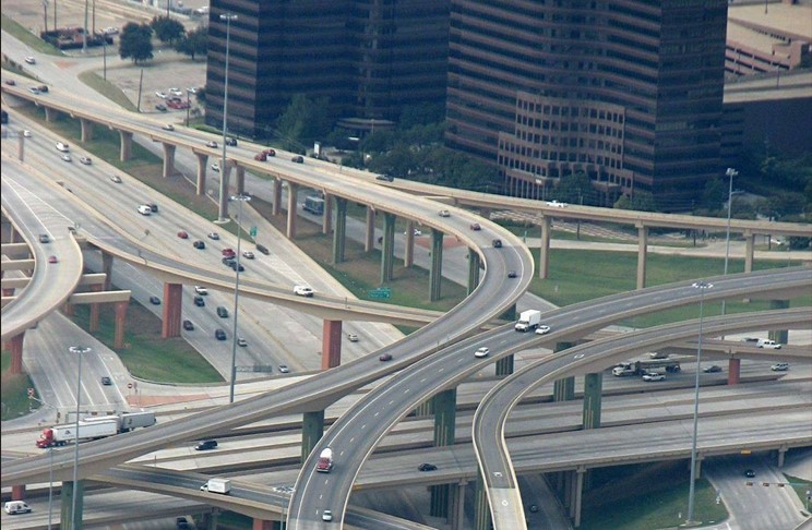 Overhead image of traffic on multliple overhead bridges and underpasses