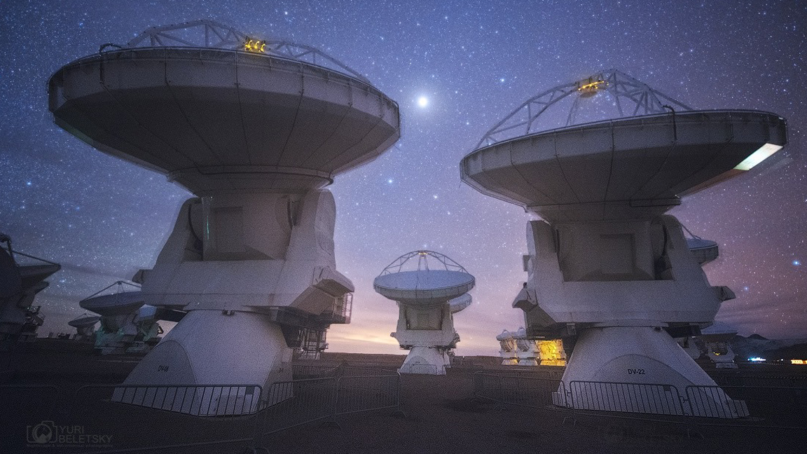 The Atacama Large Millimeter/submillimeter Array in Chile under a starry night sky