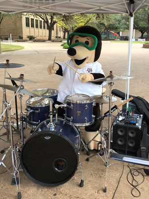 The Chemistry mole playing drums during the Texas A&amp;M Chemistry Open House