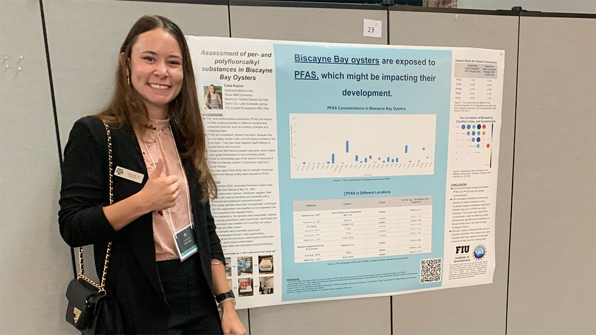 Kaylor presenting her research poster at FLUOROS Global 2021, in Rhode Island.