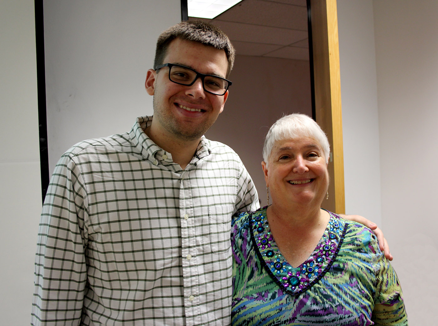 Texas A&amp;M mathematician Sue Geller smiles alongside one of her many students -- specifically, her 100th master's graduate, James DeVinney