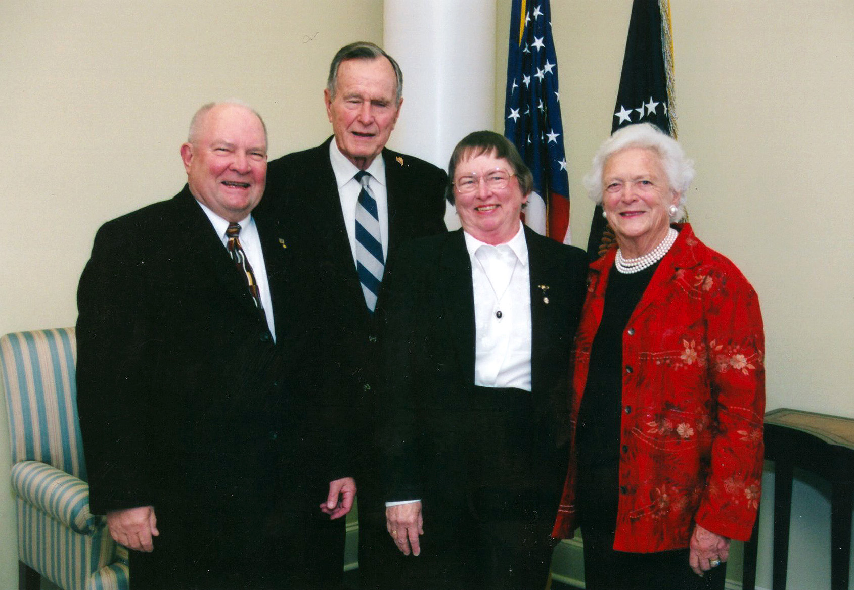 Texas A&amp;M chemist John Fackler and his wife Naomi pose with George and Barbara Bush at the November 6, 1997, dedication of his presidential library on the Texas A&amp;M University campus