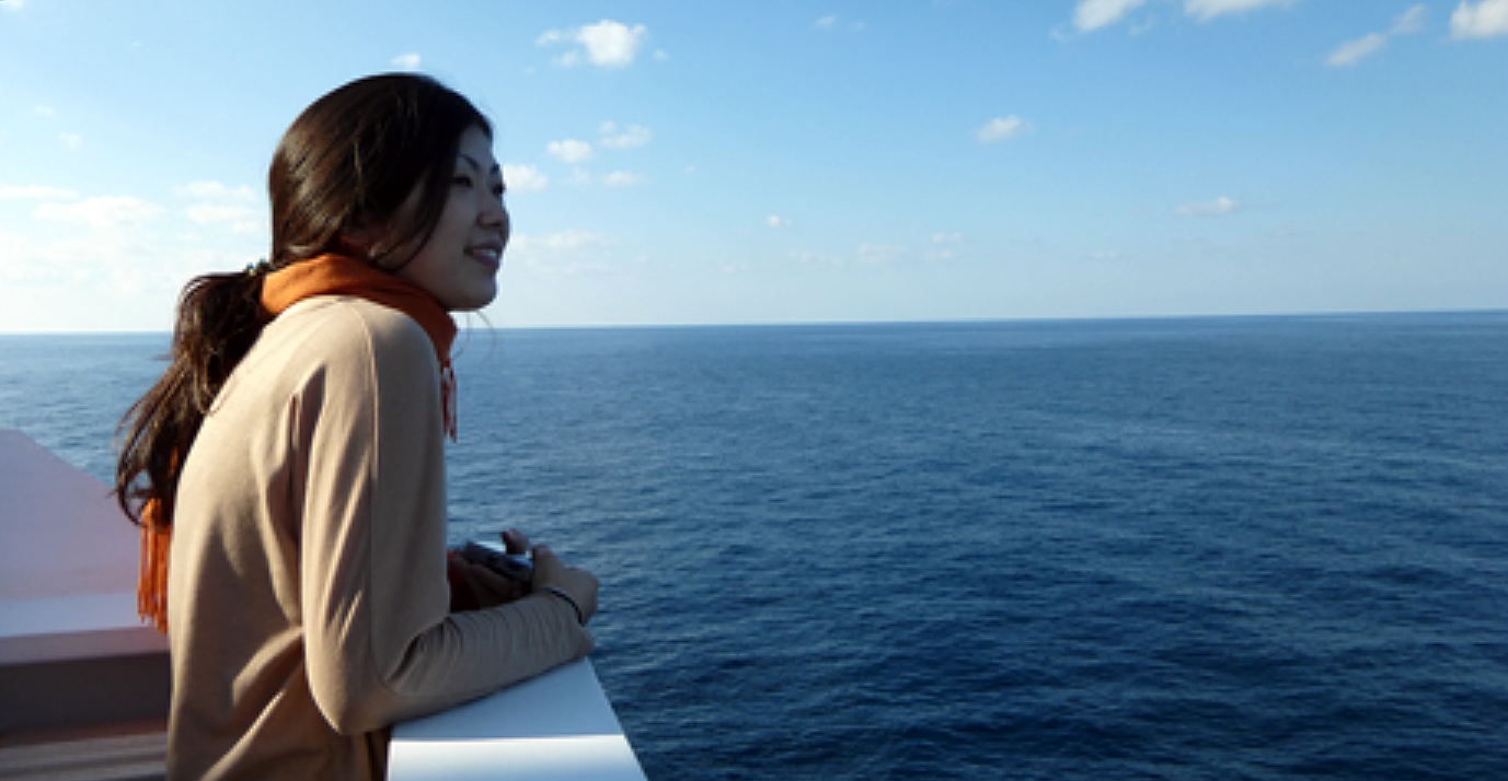 Texas A&amp;M geologist Hiroko Kitajima on deck, looking out at the open sea