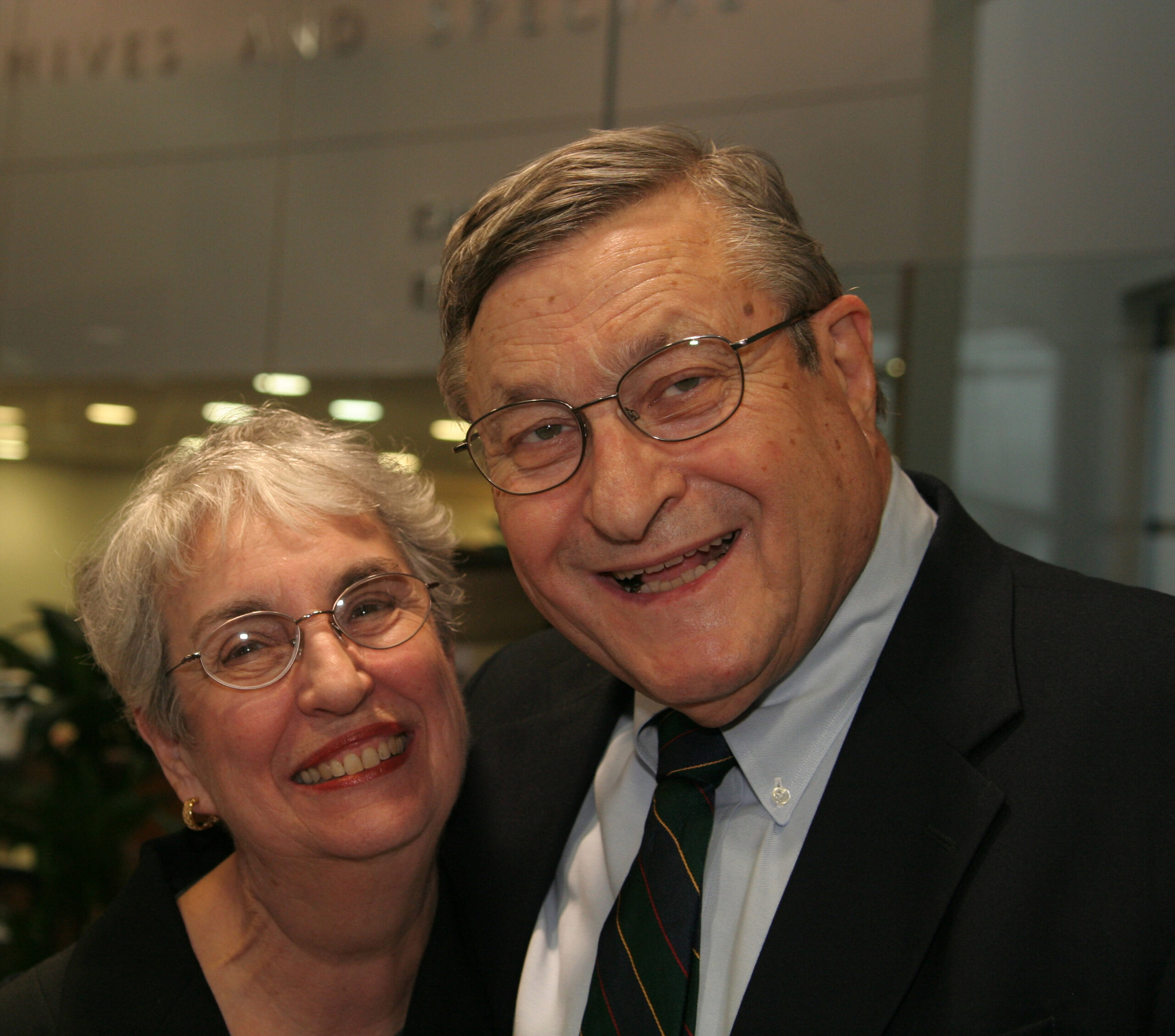 Carol and Emanuel Parzen smile for the camera at an event held in his honor at Texas A&amp;M University
