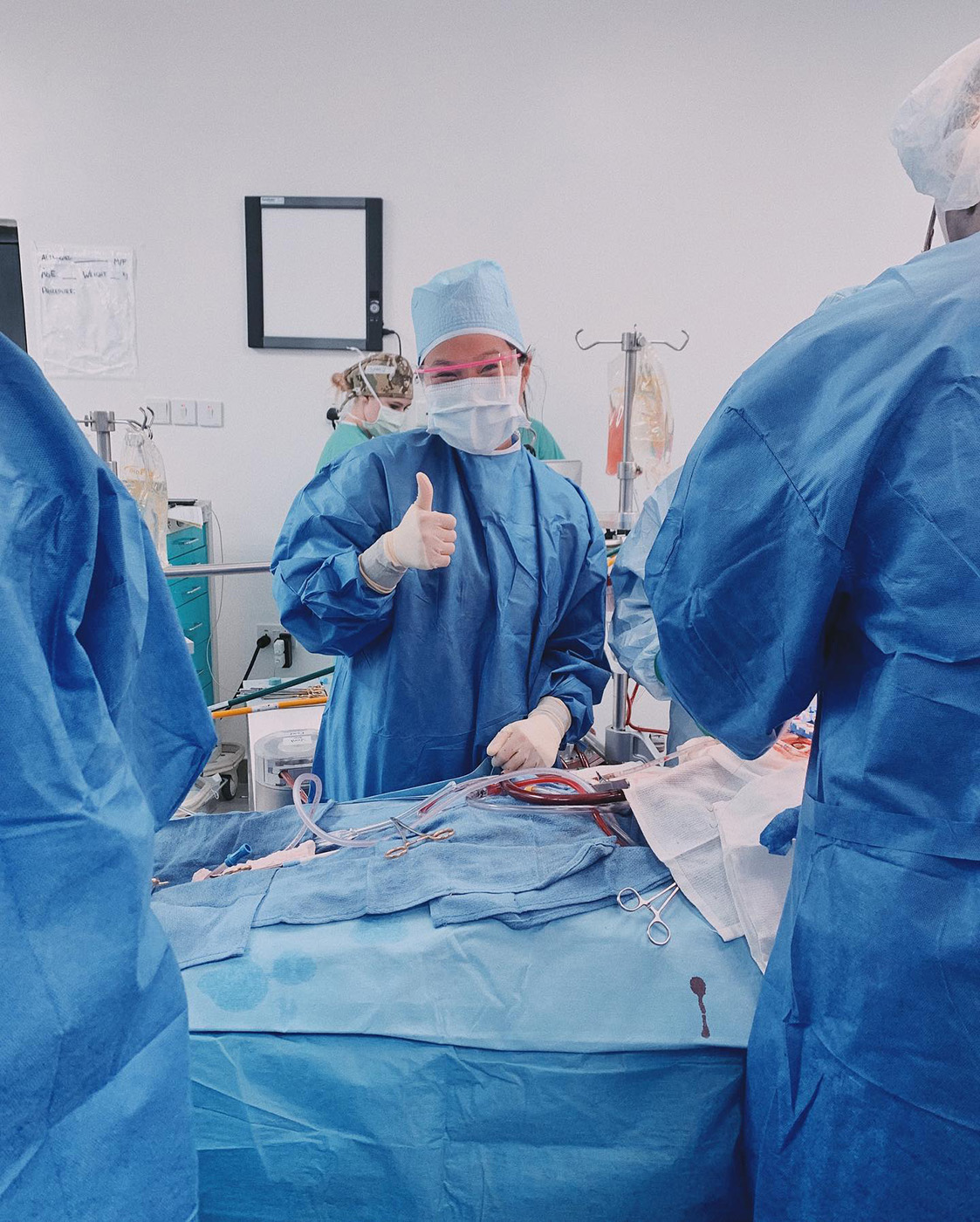 Texas A&amp;M biomedical sciences major Mya Phelps, scrubbing in for open-heart surgery during her previous trip to Nigeria in May 2022