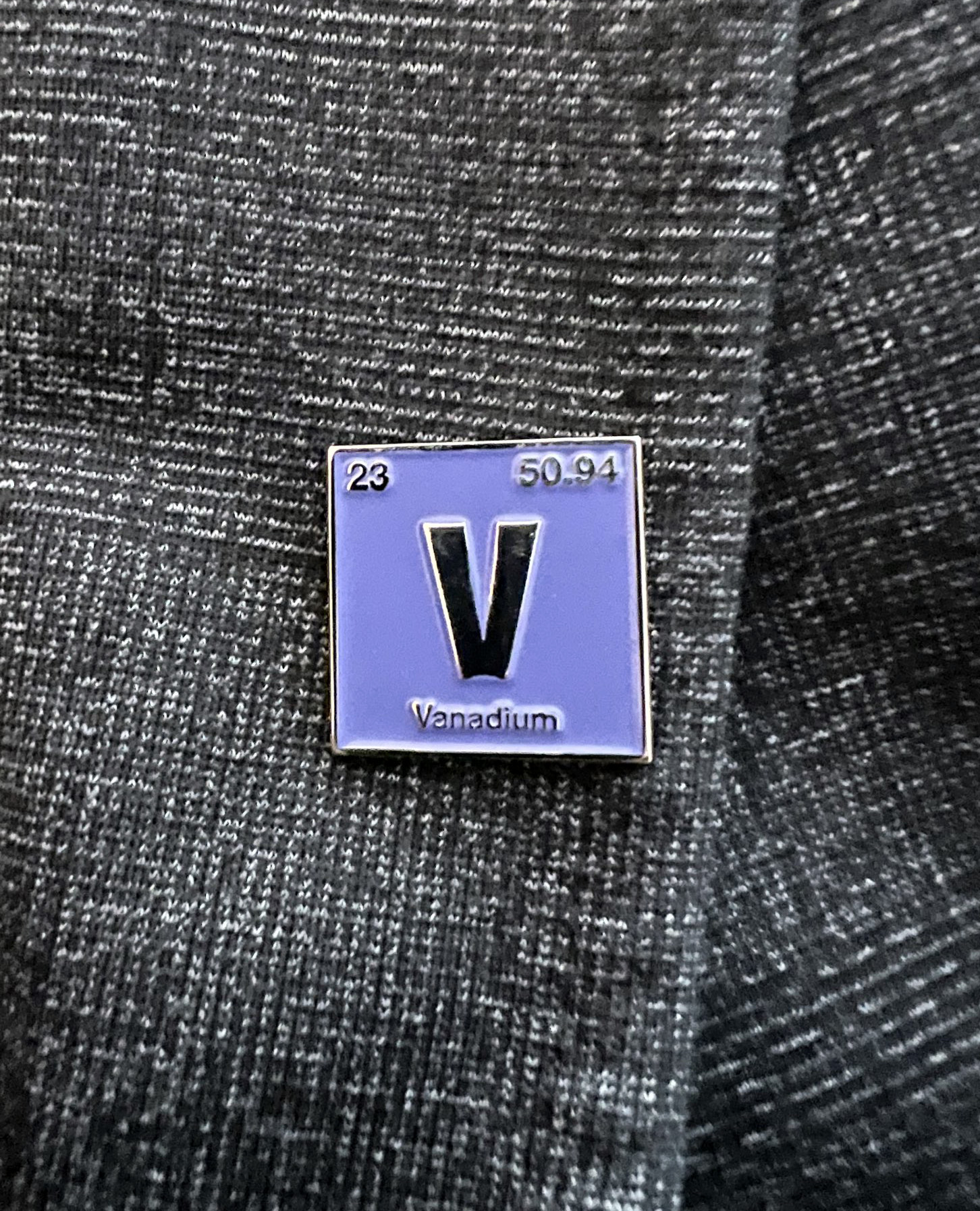 Square pin of the element vanadium as it appears in the Periodic Table