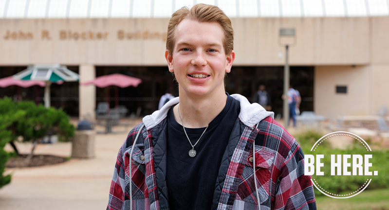 Texas A&M University statistics major Drew Kearny poses in front of the John R. Blocker Building on the Texas A&M campus