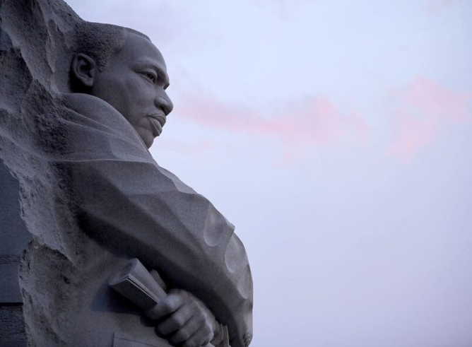 Profile view of the Martin Luther King Jr. Memorial statue in Washington, D.C.