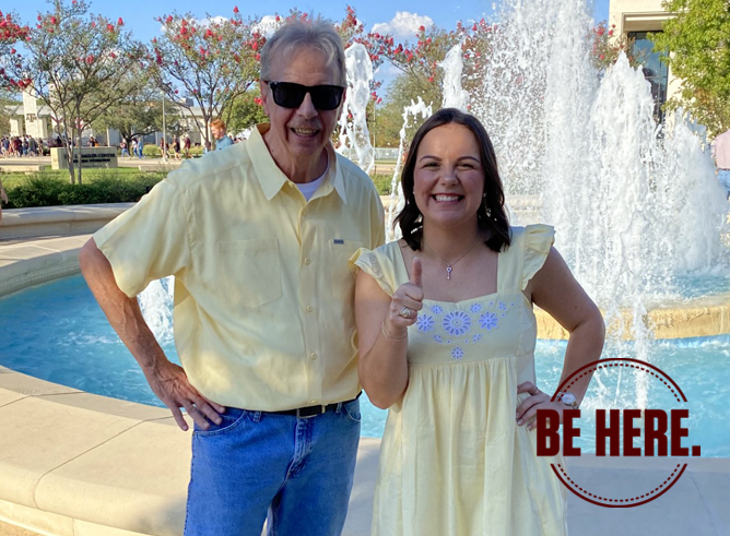 Texas A&amp;M geography senior Mackenzie Portie poses with her grandfather Michael Hoover beside the water fountain outside the Jon L. Hagler Center after receiving her Aggie Ring