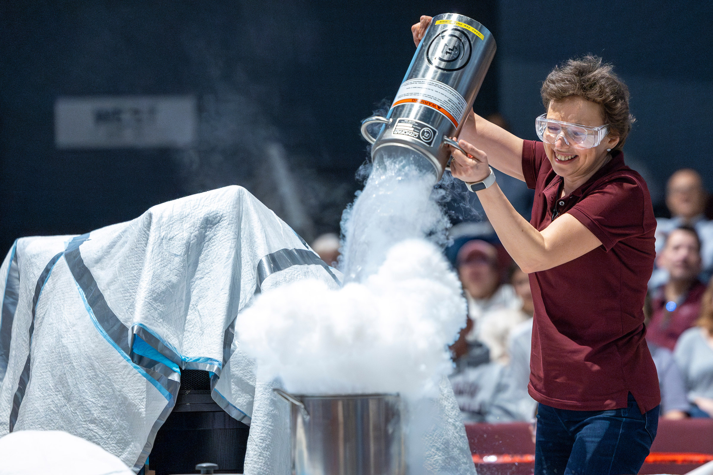 Texas A&amp;M University physicist Tatiana Erukhimova smiles as she performs a demonstration involving liquid nitrogen at Aggieland Saturday on February 10, 2024