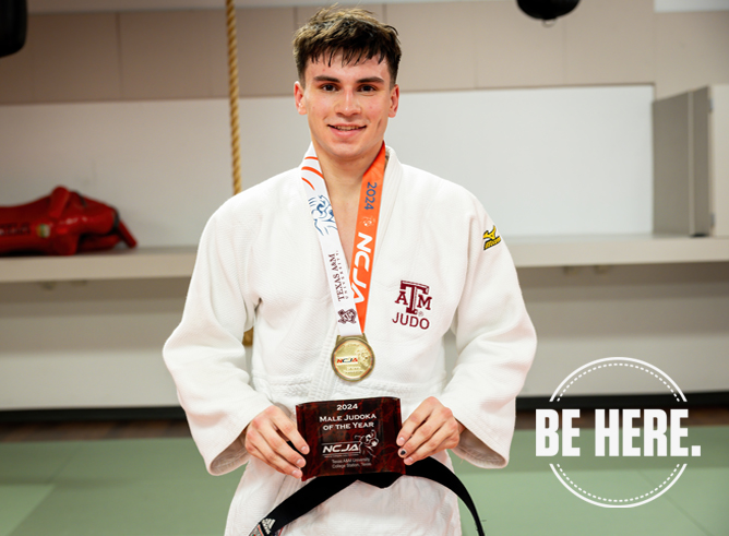 Texas A&amp;M University applied mathematics major Paolo Maaskant poses in his judo robe with his first-place plaque