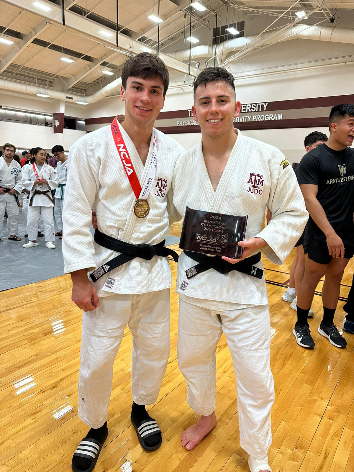 Texas A&amp;M University applied mathematics major Paolo Maaskant (left) and his brother Dario Maaskant pose with their second-place team finish plaque at the 2024 Collegiate National Championships hosted at Texas A&amp;M University