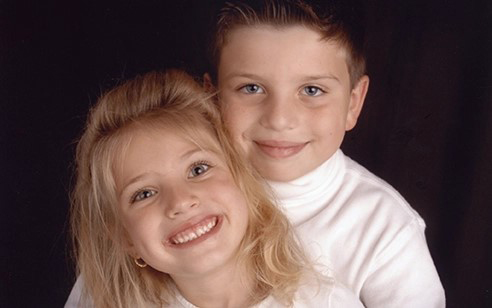 Texas A&amp;M University former students Noelle and Joseph Levantino, pictured together as children