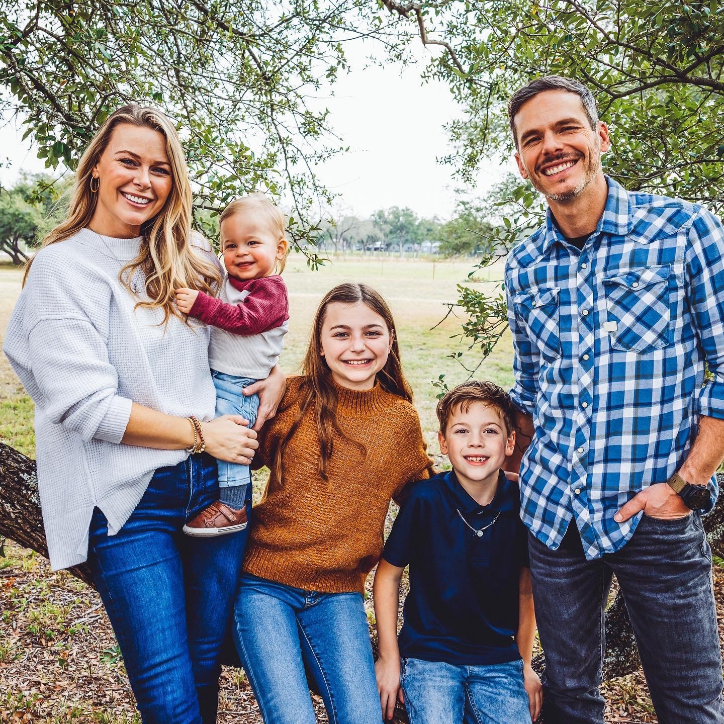 2002 Texas A&amp;M University history graduate Granger Smith, pictured with his wife, Amber, and their children Maverick, London and Lincoln