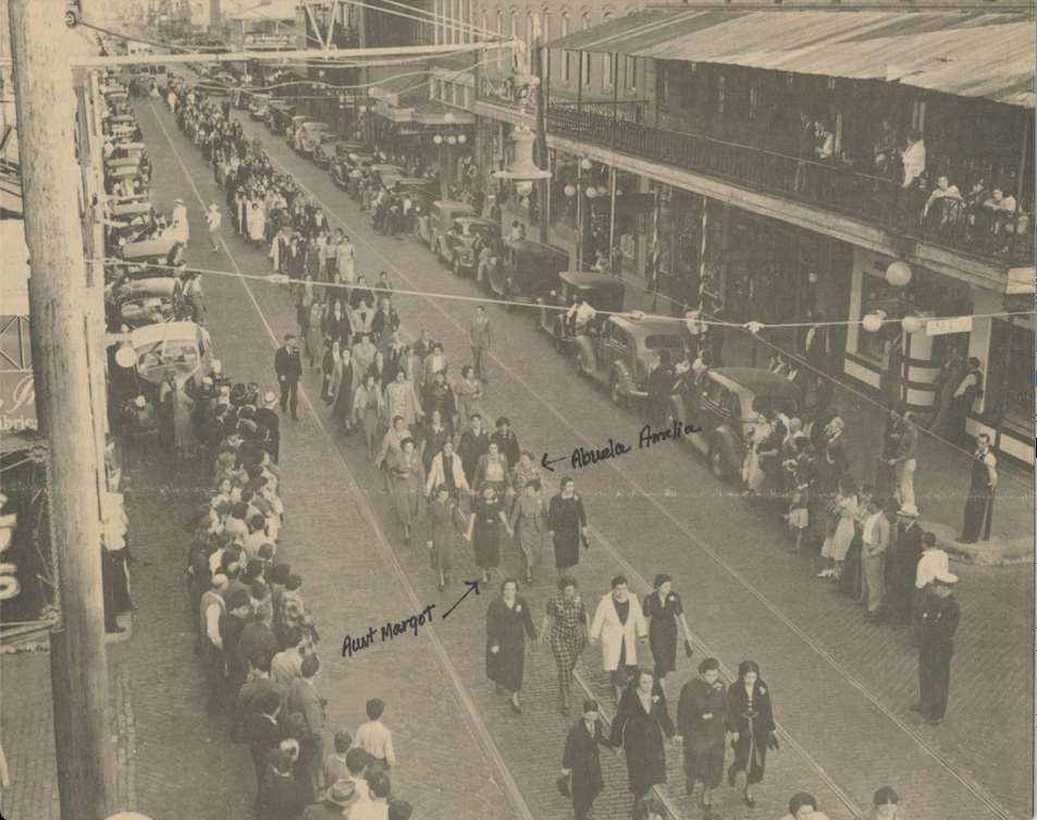 Black and white newspaper clipping of 1937 antifascist march in Ybor City, with handrwiting and arrows indicating McNamara's family.