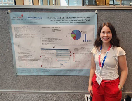 Kaitlin Tindel presenting a scientific poster titled "Improving Medication Safety for Pediatric Patients: Utilization of a Simplified Digoxin Order Panel" at a conference, with logos of UT Southwestern Pediatrics visible.