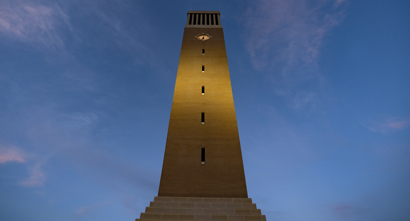 The Albritton Tower on the campus of Texas A&M at night..