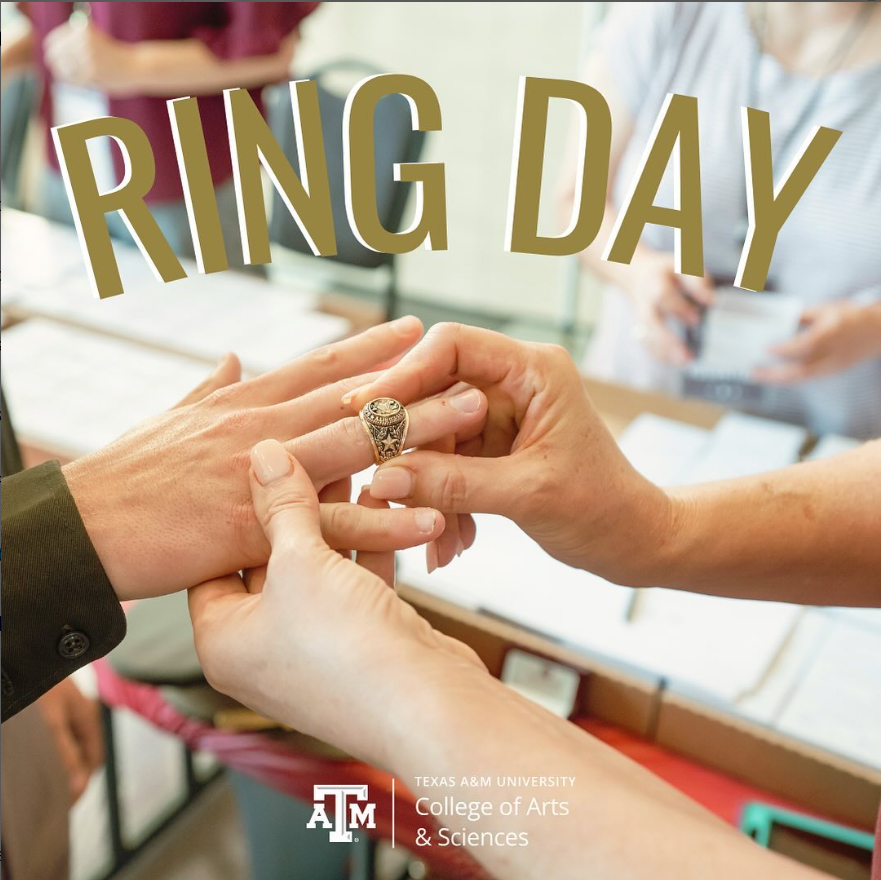 An Aggie ring is placed on the right hand of the new owner